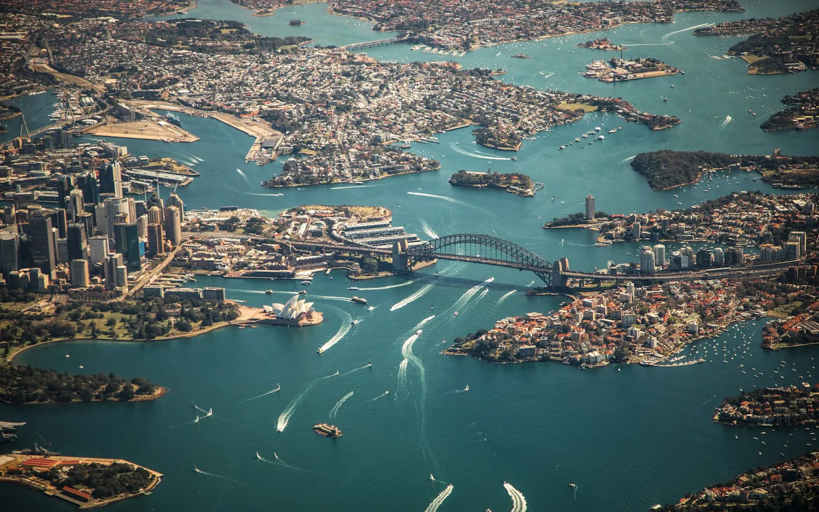 An aerial view of the Sydney Harbour Bridge and Opera House in Sydney, Australia