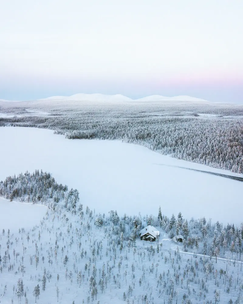 Snow-covered forest in Finnish Lapland seen from above