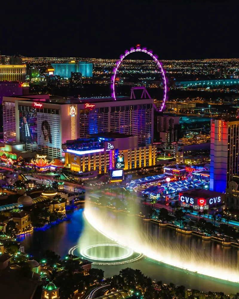 city with lights turned on during night time