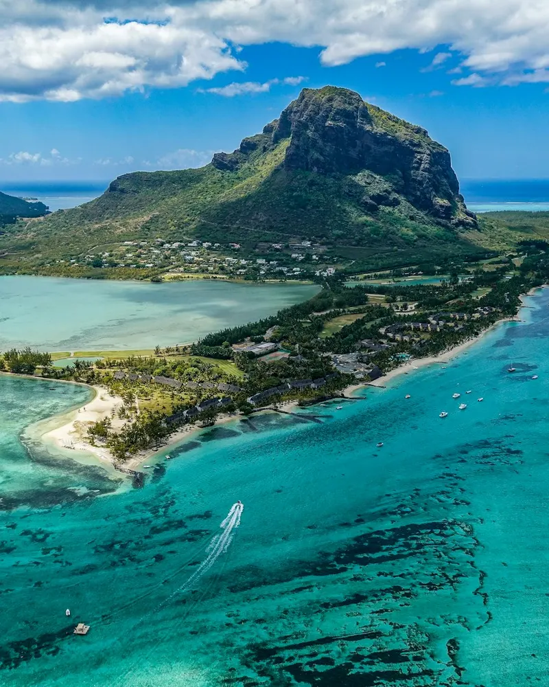 aerial photography of island beside body of water