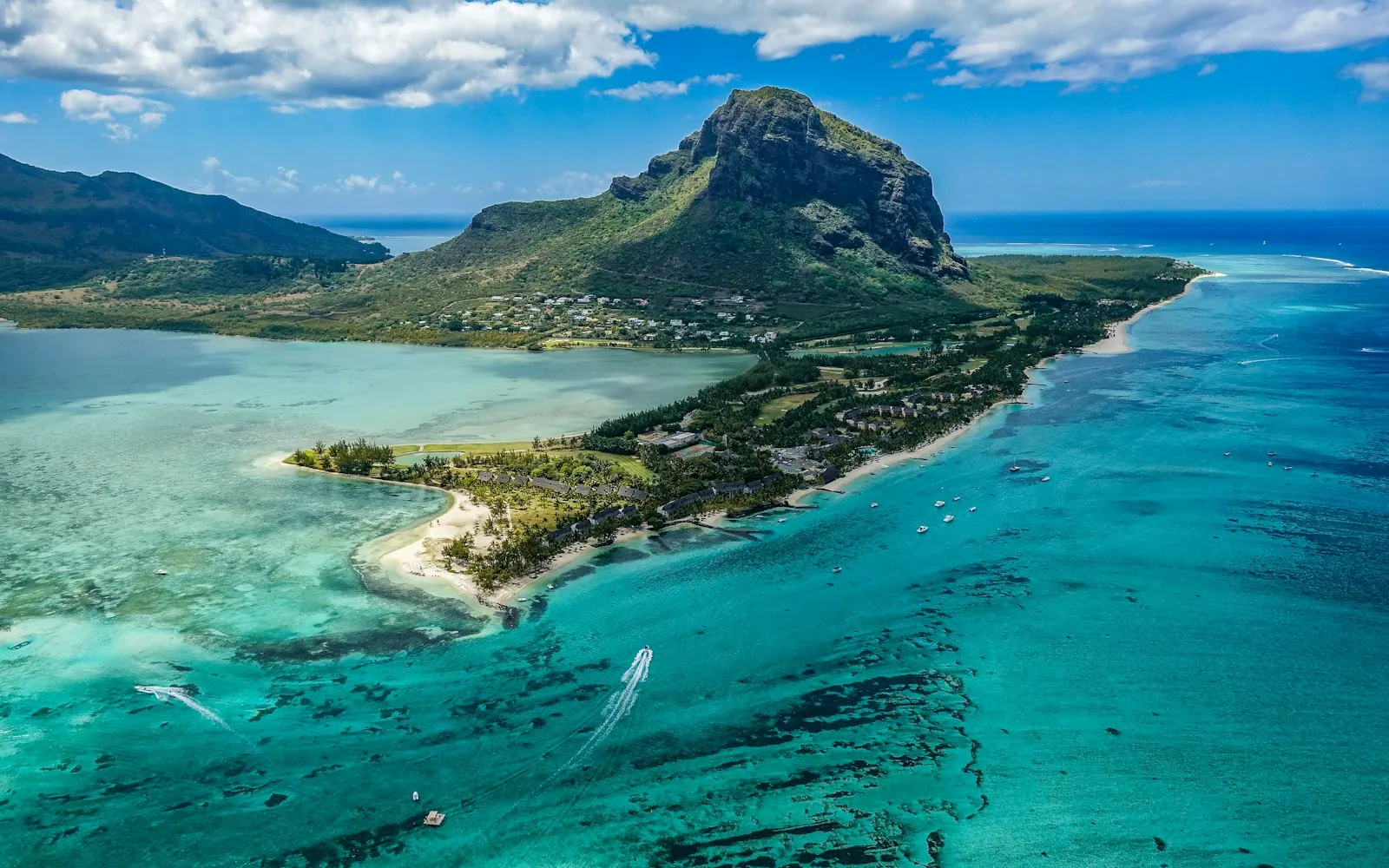 aerial photography of island beside body of water
