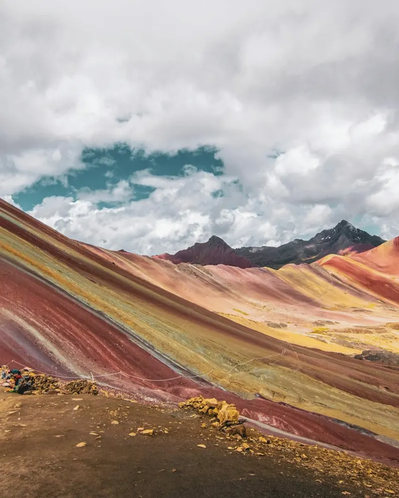 mountain under gray clouds