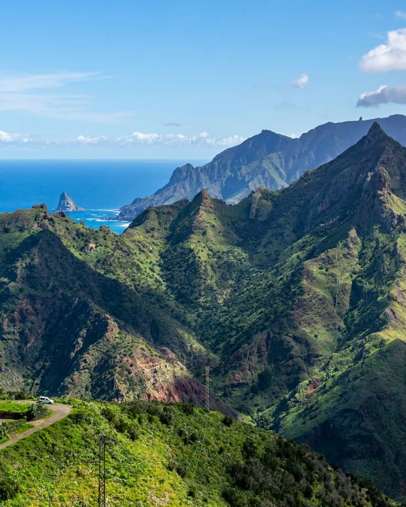 a scenic view of the mountains and ocean
